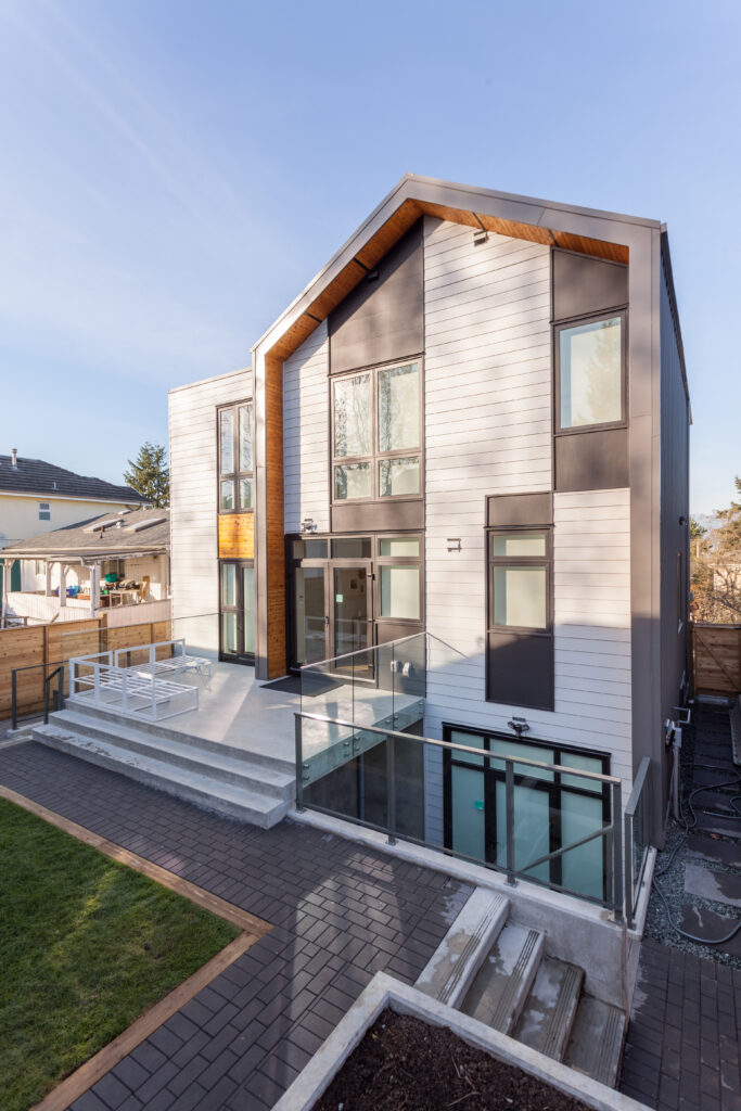 Three-unit infill (main home with suite, and lock-off suite); plus laneway; Project Team: Project Mint; Photo Credit: Nick Bray. 4 units; Triplex; 2 blg