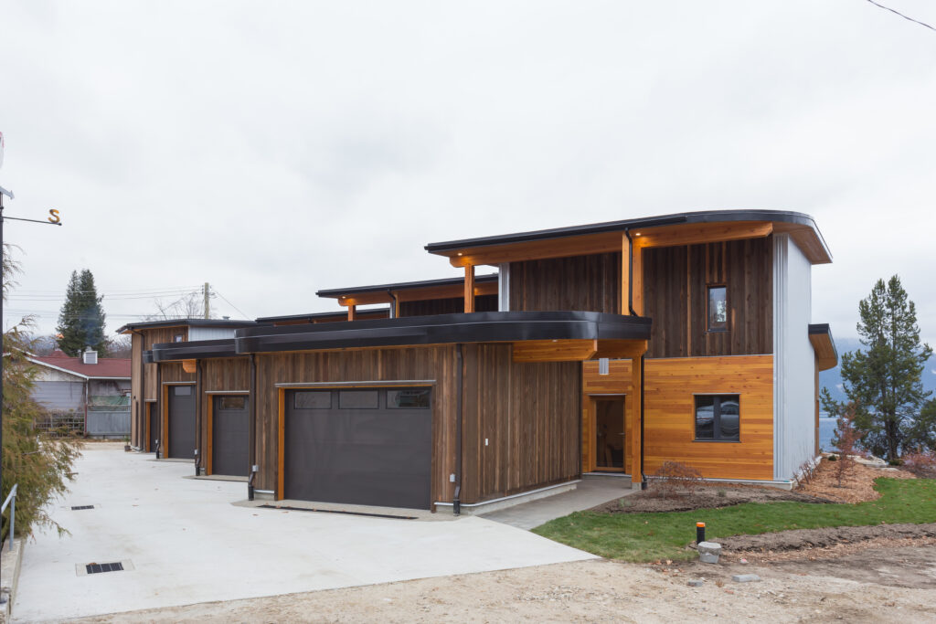 Bell Passivehouse Triplex, with Caretaker Carriage Home; Project Team: Cover Architectural Collective; Photo Credit: Matt Bolt. 4 units; Triplex_Carriage Suite; 2 blg