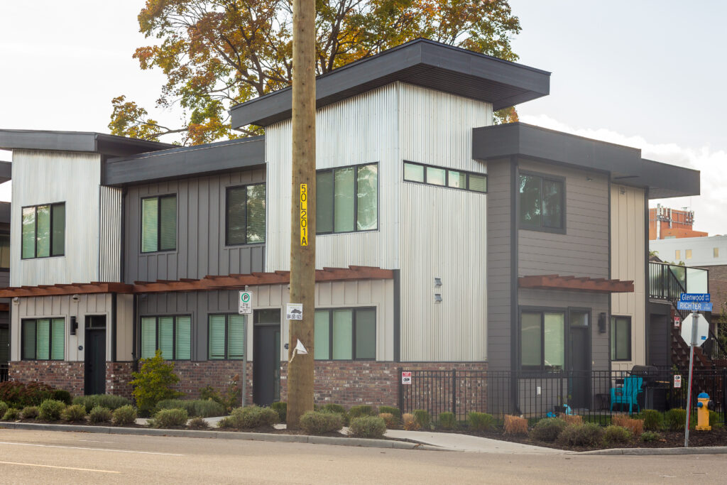 Two Fourplexes on corner lot; Project Team: Unknown; Photo Credit: Arlene Janousek. 8 units; Townhomes; 2 blg