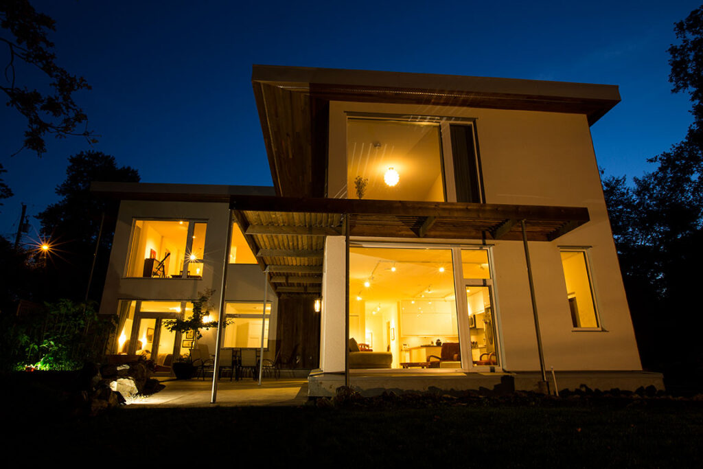 Passive House Duplex built into a hill; Project Team: Bernhardt Contracting; Photo Credit: Bernhardt Contracting. 2 units; Duplex; 1 blg