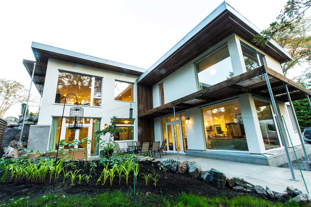 Passive House Duplex built into a hill; Project Team: Bernhardt Contracting; Photo Credit: Bernhardt Contracting. 2 units; Duplex; 1 blg